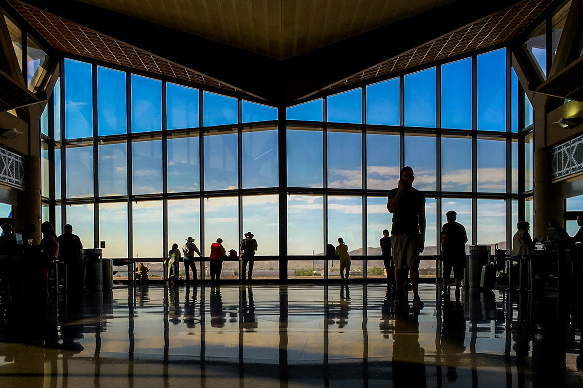 Friends traveling together at the airport